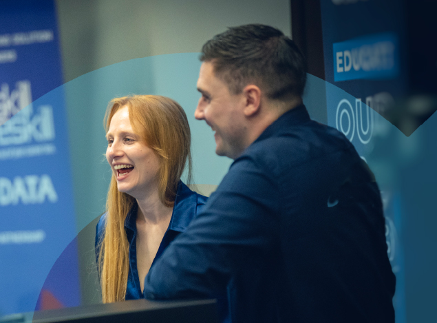 Dan and Vicky exhibiting at a conference together